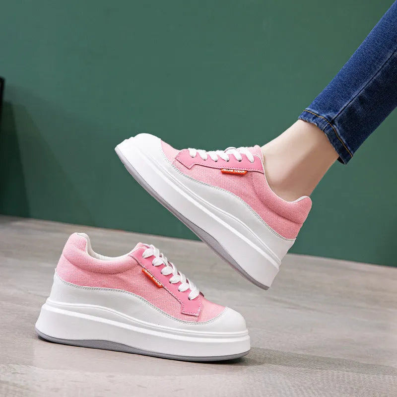 Women's beige and pink thick-soled leather board shoes on a white background.