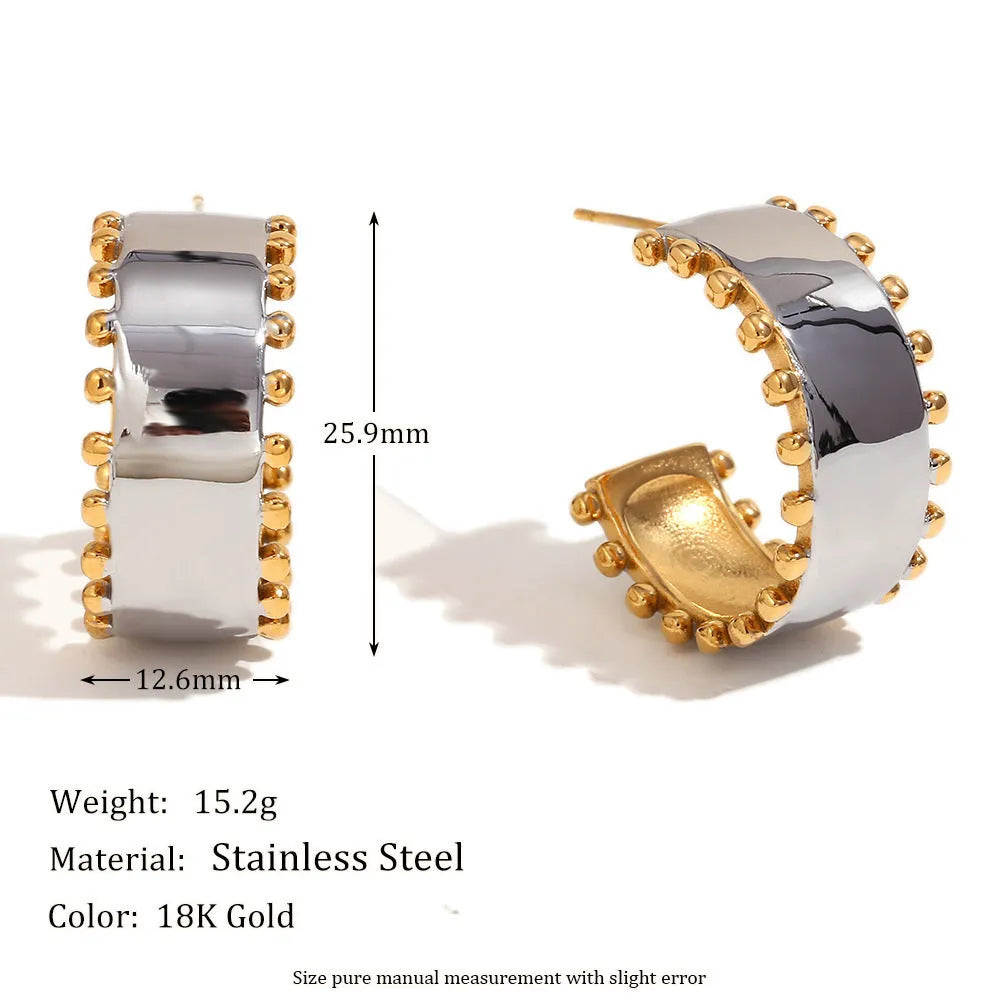 Gold electroplated geometric jewellery set with earrings, bracelet, and necklace on stainless steel