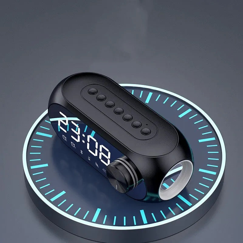 Mini portable Bluetooth speaker with clock display in black, white or blue colours showing extra bass and USB power