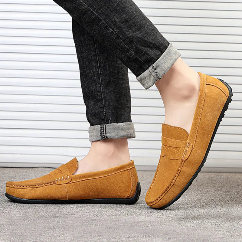 Men's suede leather slip-on loafers in various colours with a flat rubber sole and round toe