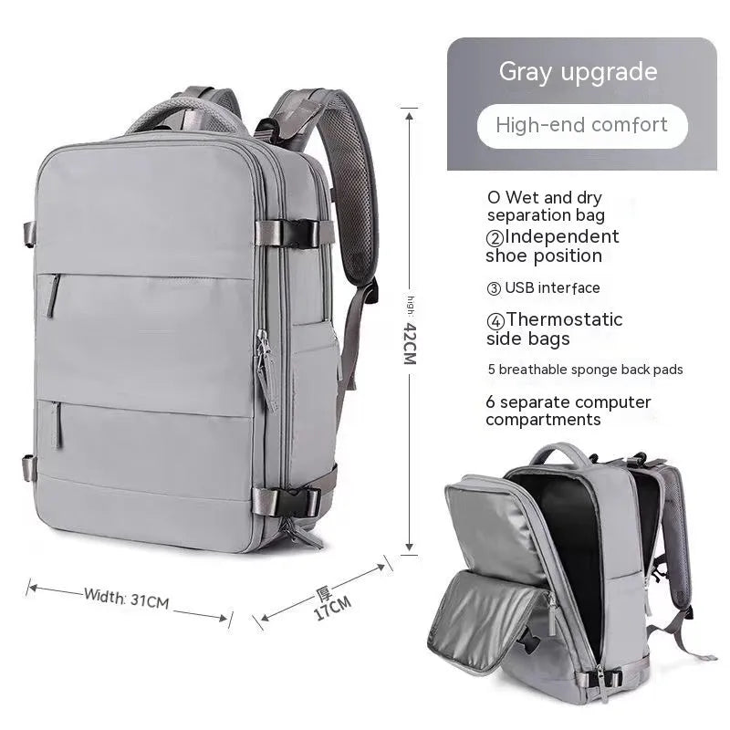 Large black waterproof nylon mummy backpack with zipped compartments.