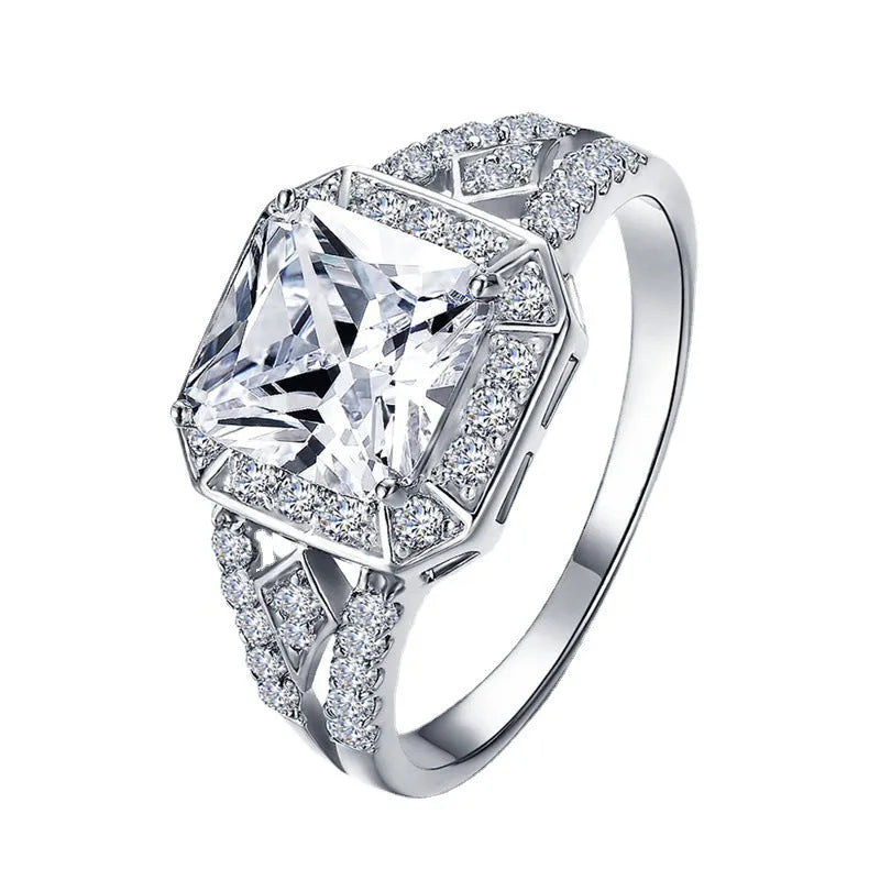 Women's platinum-coloured hollow geometric ring with quadrilateral ornament design and inlaid zircon stones