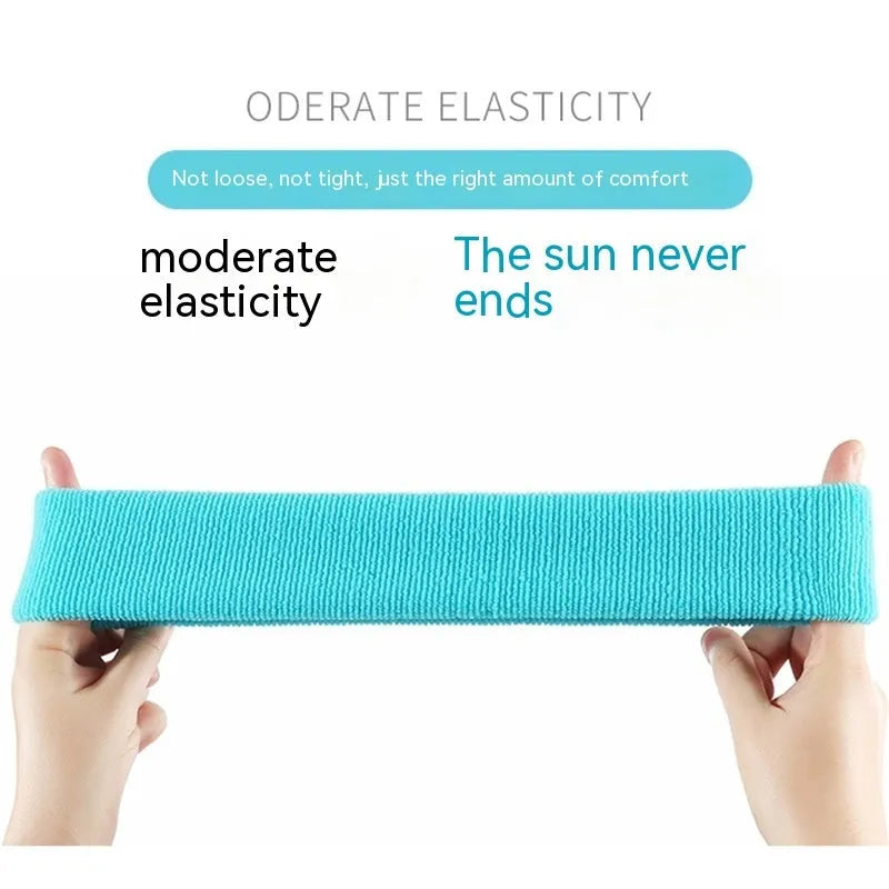 A widening sports sweat band in a solid colour, made from elastic polyester spandex material.
