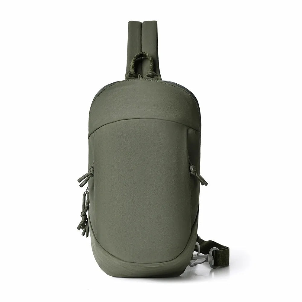 Outdoor crossbody bag in nylon fabric with mobile phone compartment, shown in army green colour