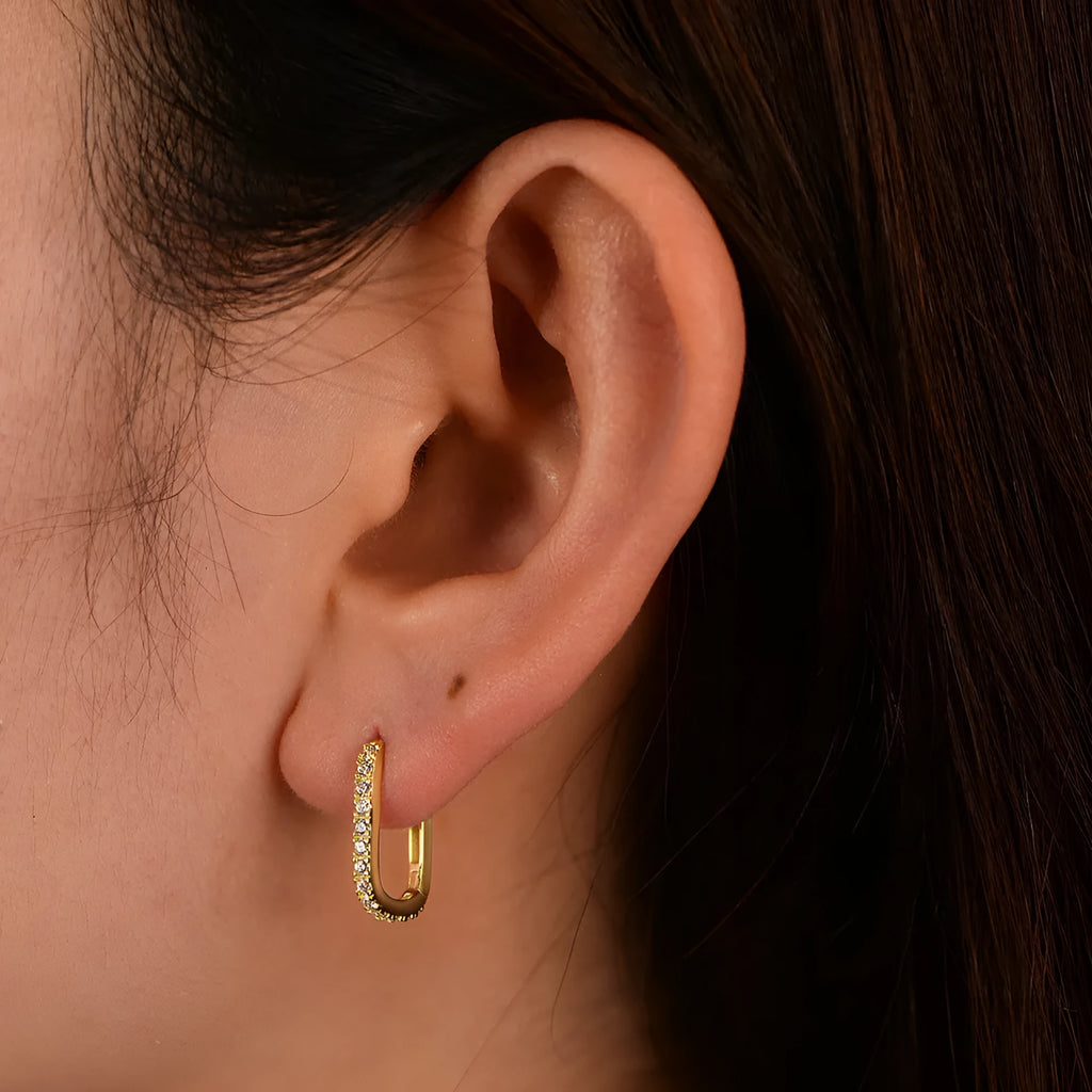 Sterling silver oval zircon ear clip earrings in geometric design