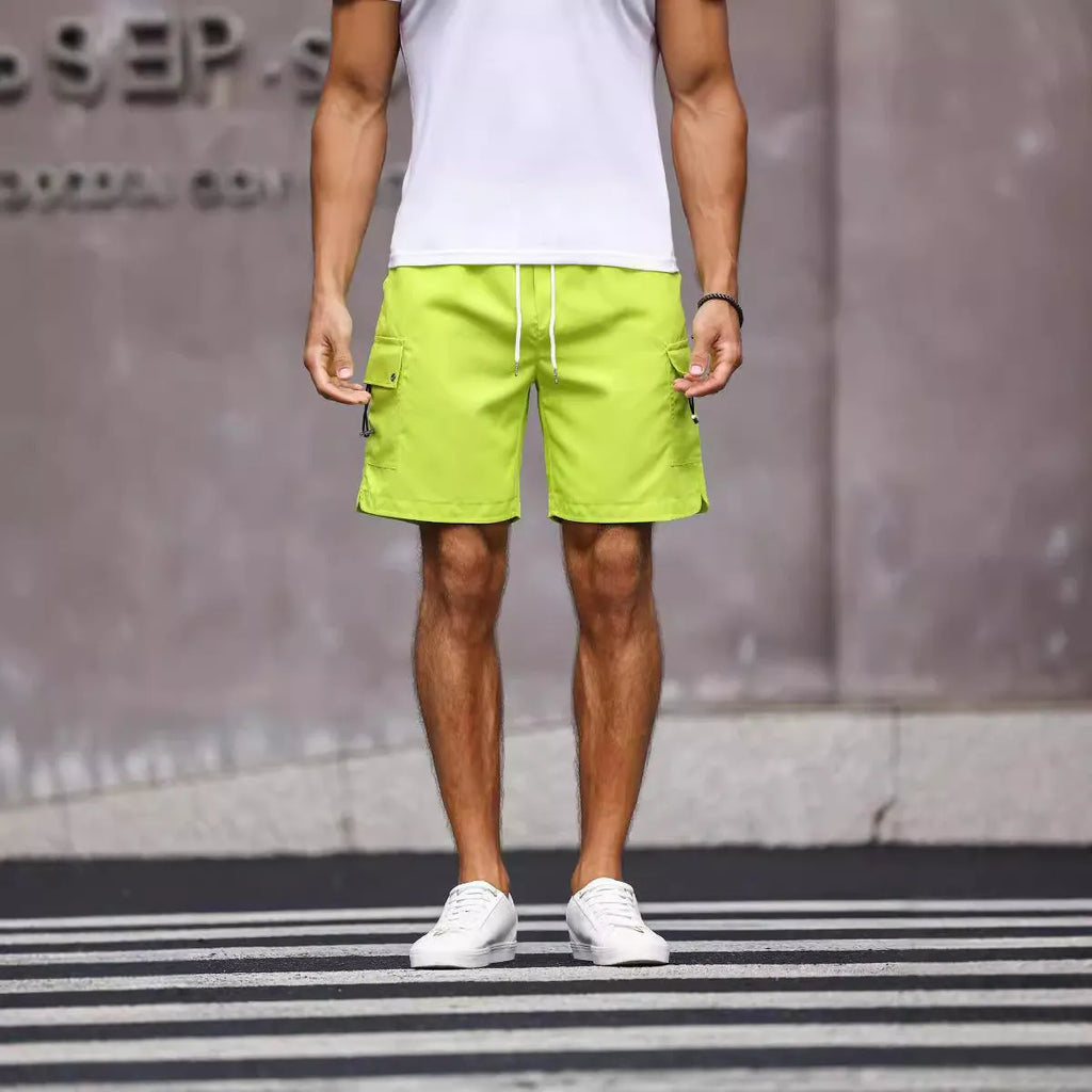 Men's loose fit work shorts in fluorescent green or army green colours with straight leg design