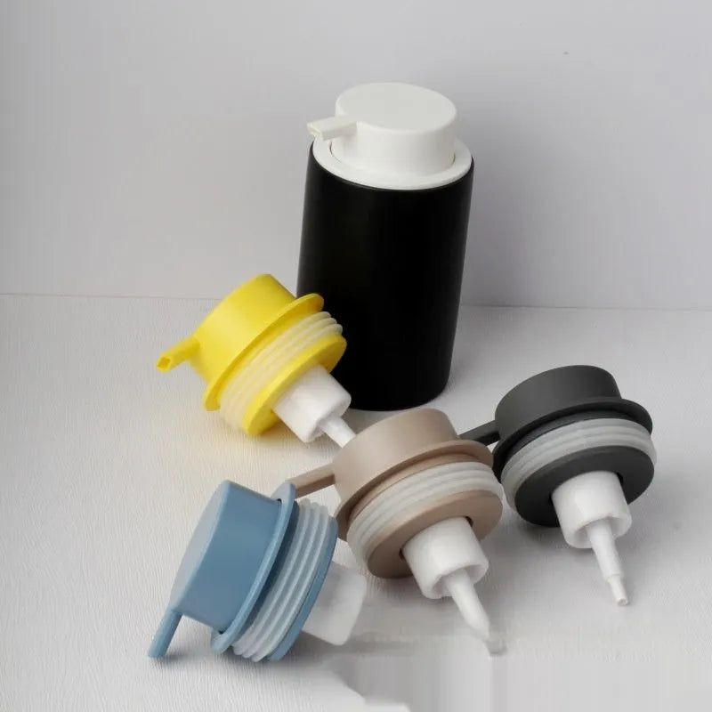 ABS plastic manual foam pump head for soap or cleanser in gold, silver, black, and Asian gold colours