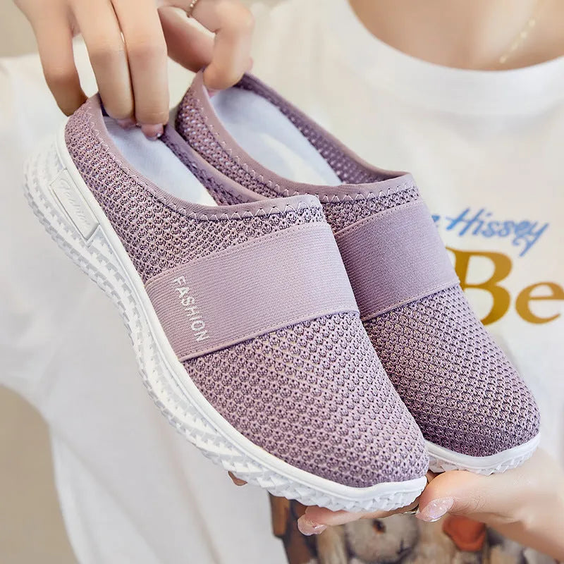 Women's mesh casual shoes with flat heel, hollow-out detailing, and round toe in multiple colour options