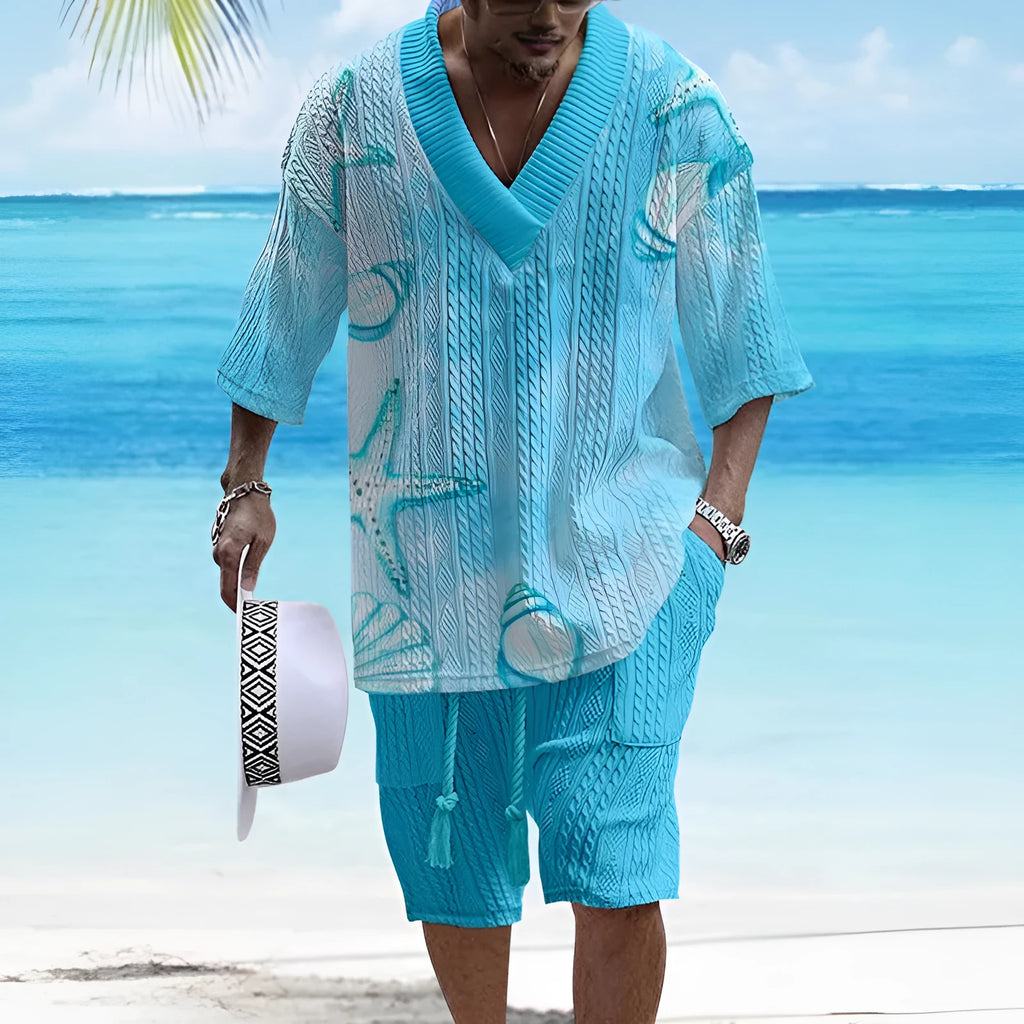 Man wearing a loose blue short sleeve top and matching casual shorts from a polyester suit set.