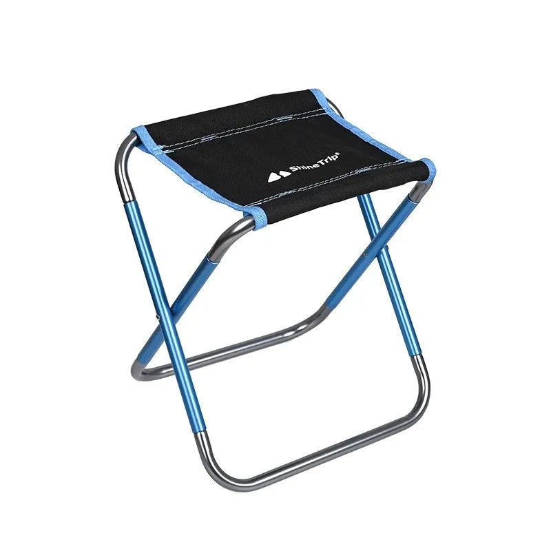 Black aluminium alloy folding stool in collapsed position for camping and outdoor use
