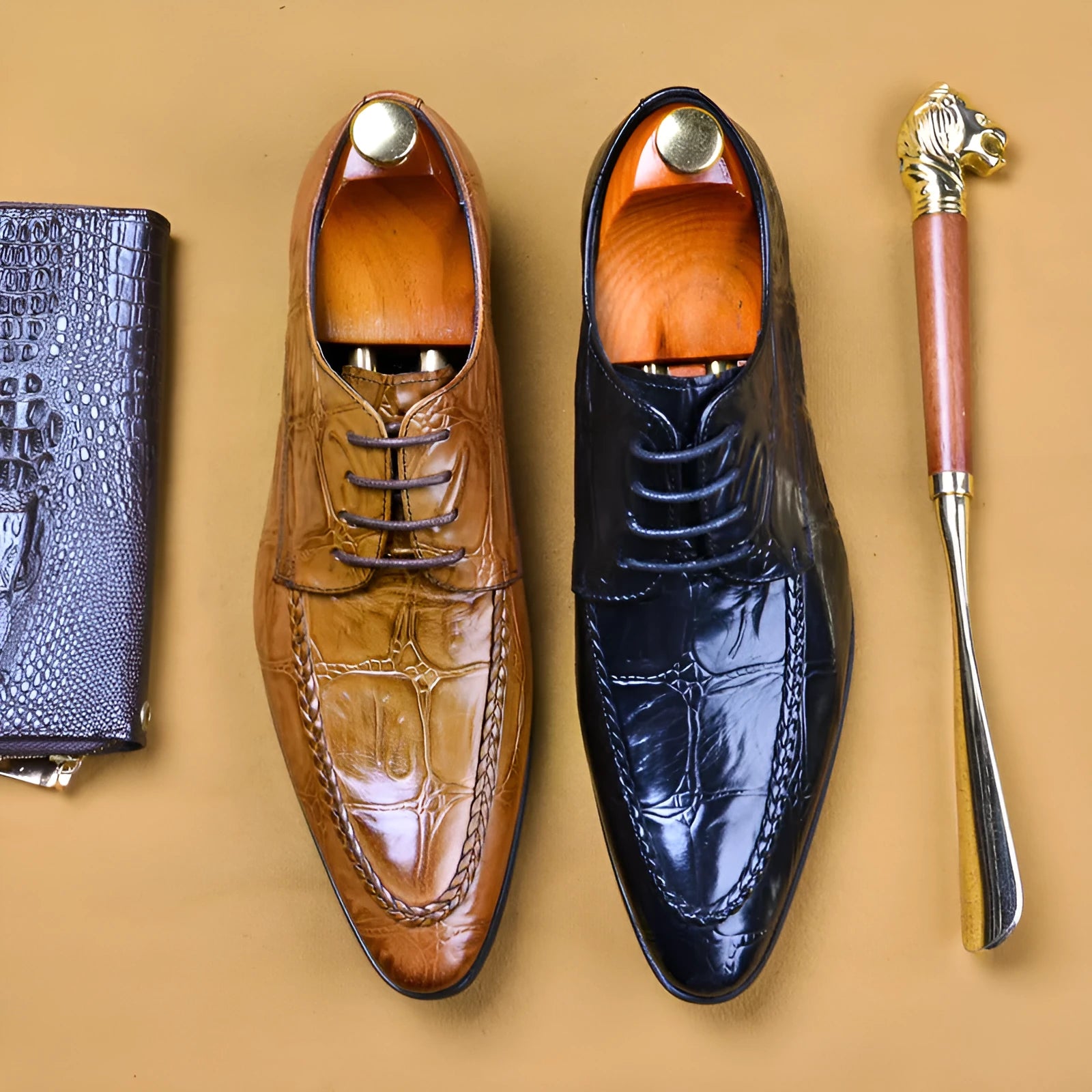 Men's brown leather loafers with a silver horse bit buckle on a rubber sole.