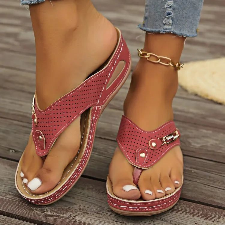 Women's retro-style flip-flop sandals in beige with PU upper and EVA sole, showing herringbone footbed texture.
