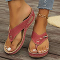 Women's retro-style flip-flop sandals in beige with PU upper and EVA sole, showing herringbone footbed texture.