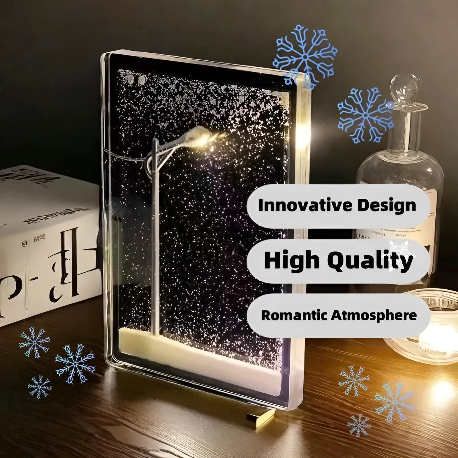 DIY snowy landscape Christmas night light kit with LED lights and gift bag on a desktop