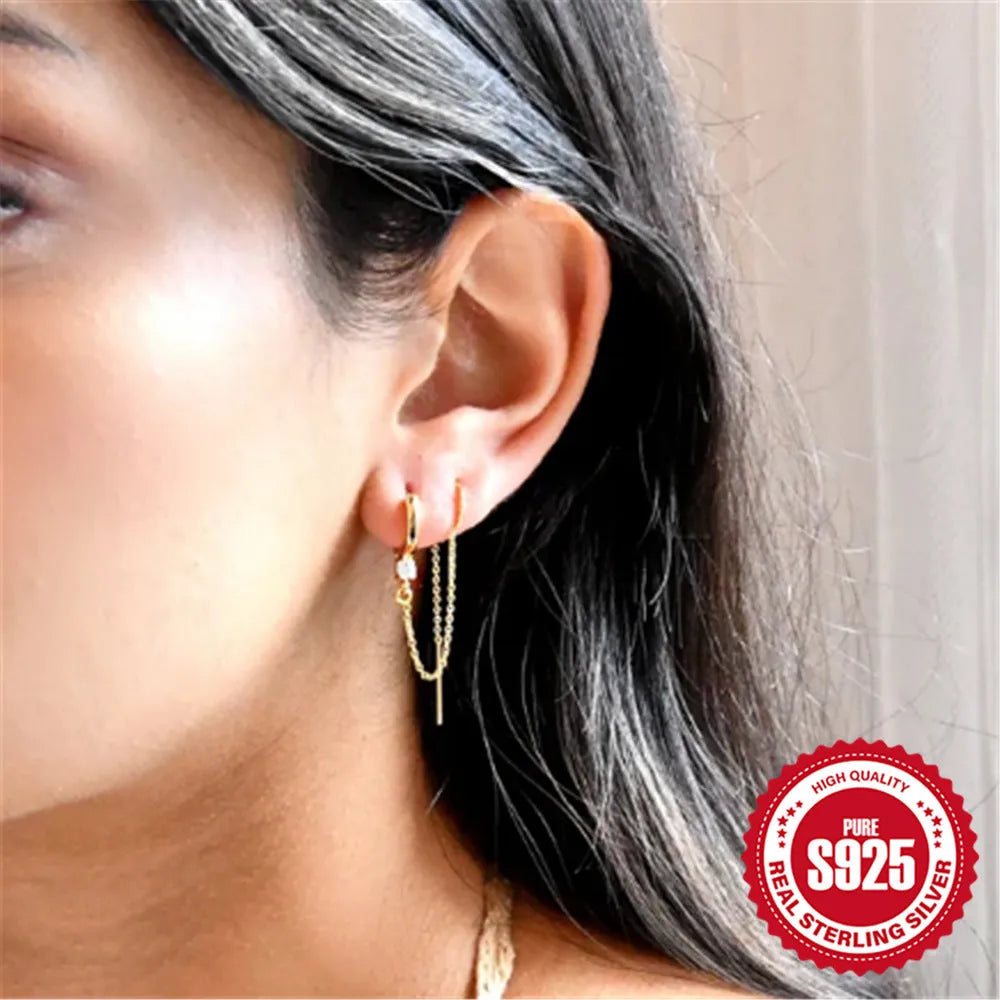 Geometric S925 sterling silver stud earring with flower, tassel, and chain design in a golden electroplated finish.