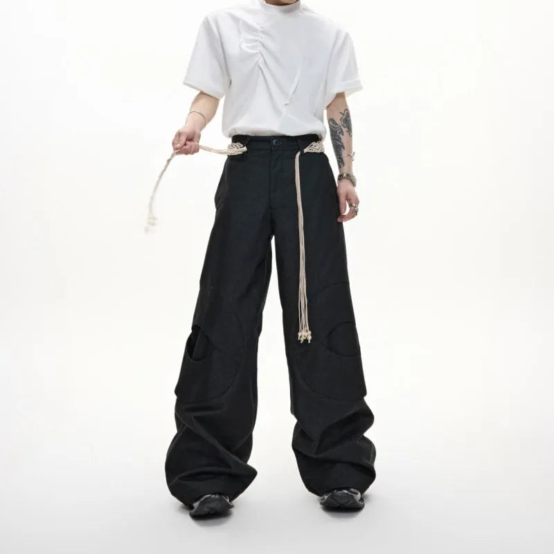Men's straight-leg cotton trousers in dark colours with placket zipper and decorative pocket details