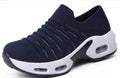 Plus size women's and men's stretch knit sock shoes in dark blue with fly-knit mesh upper.