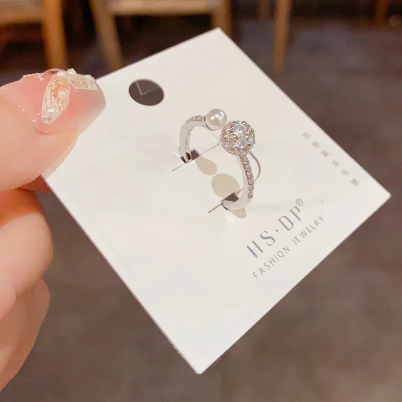 Women's open-end ring with round zircon and thick gold plating in geometric design