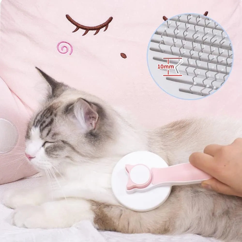 Blue self-cleaning cat brush with massage needles and rubber handle for pet grooming