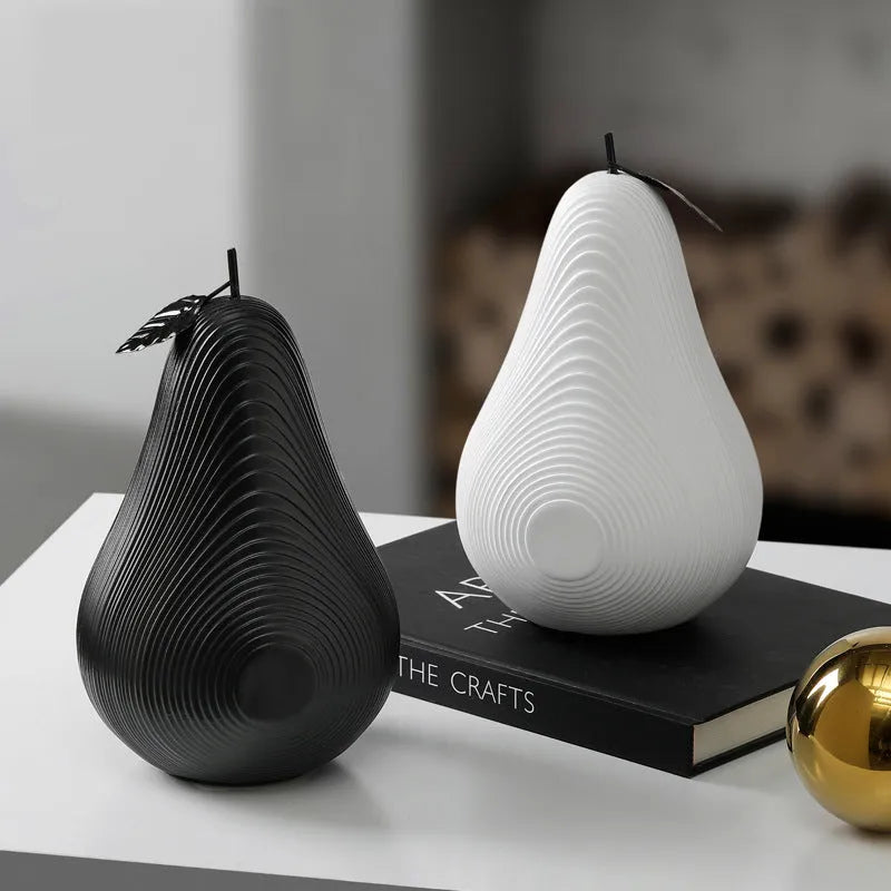Resin decorative crafts set showing high black apple and low white pear sculptures