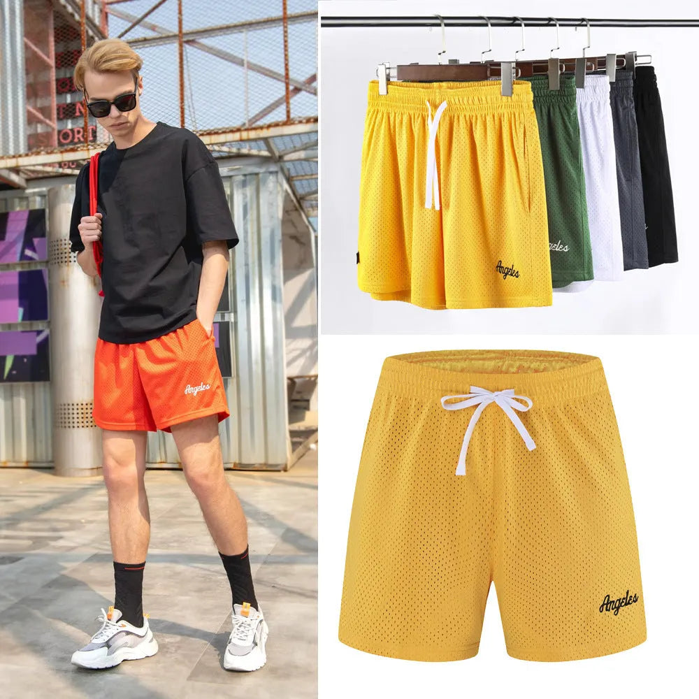 Men's double-layer mesh shorts in sports purple showing mesh texture and sport styling