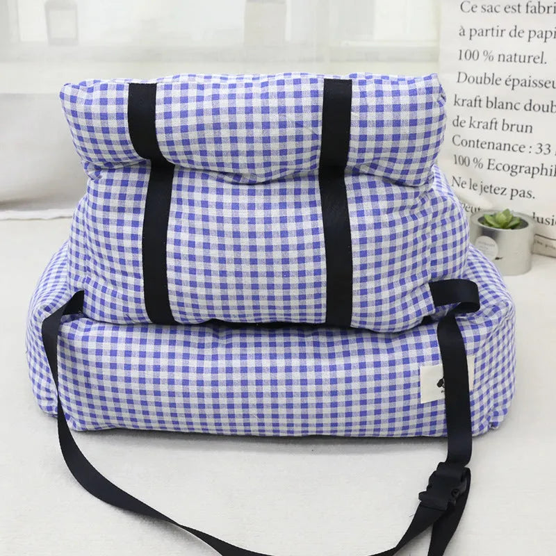 Car-mounted pet travel nest in stain-resistant cloth with grey or blue plaid options