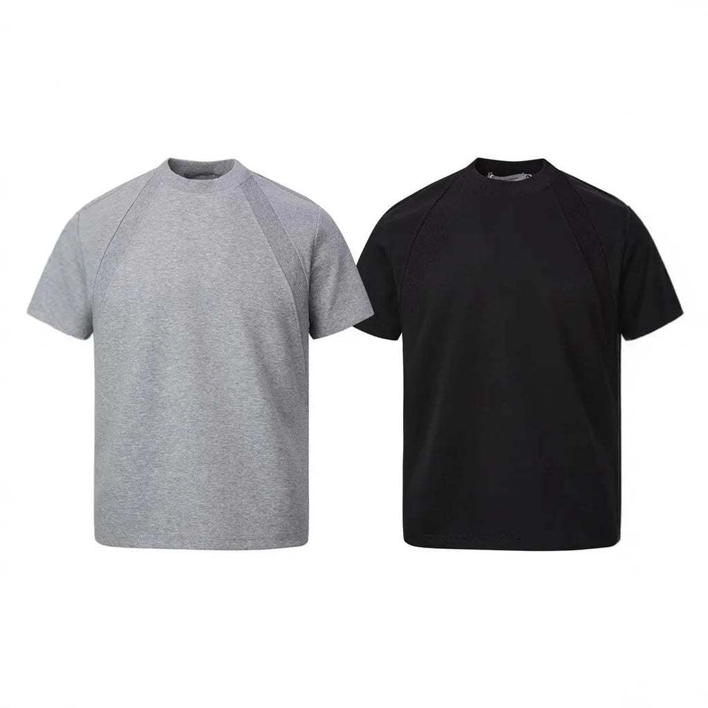 Men's black short sleeve top with air layer stitching detail, loose fit design