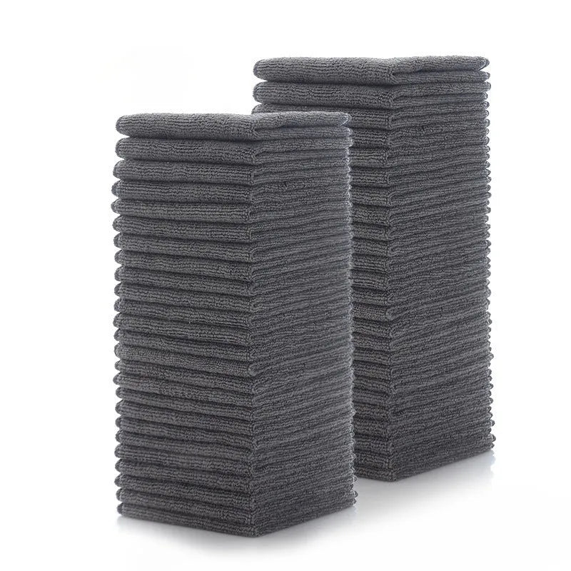 Grey square microfiber kitchen cleaning cloth for oil and grease.