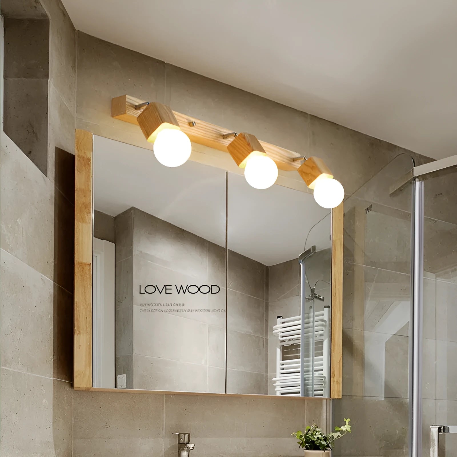 Single-head circular LED wall lamp with a 24cm diameter, mounted on a plain wall.