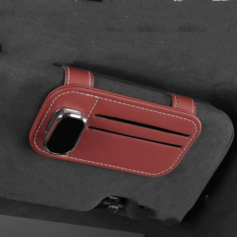 Leather car sun visor card holder with sunglasses clip in snap-on design available in multiple colours.