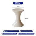 Green plastic hourglass-shaped shoe changing stool for children and adults