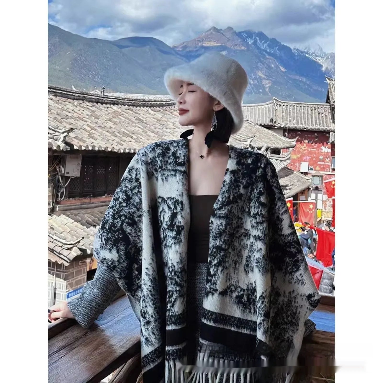 Women's polyester scarf cape with tassel edges worn as shawl in casual style