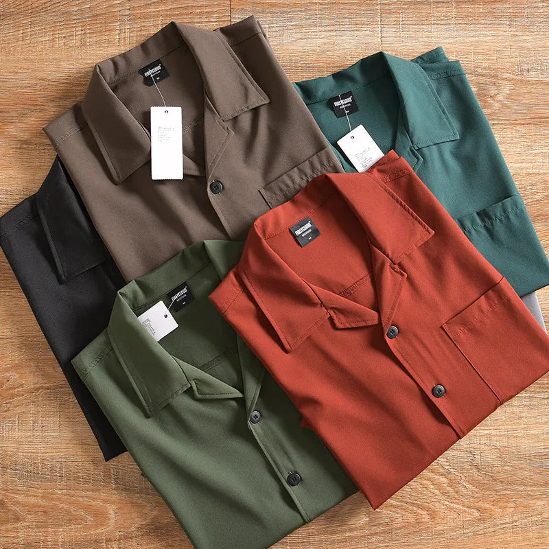 Men's loose-fit lightweight short sleeve shirt in solid colour, shown in Army Green.