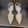 Women's silver and black hollow high heels with red sole and pointed toe design