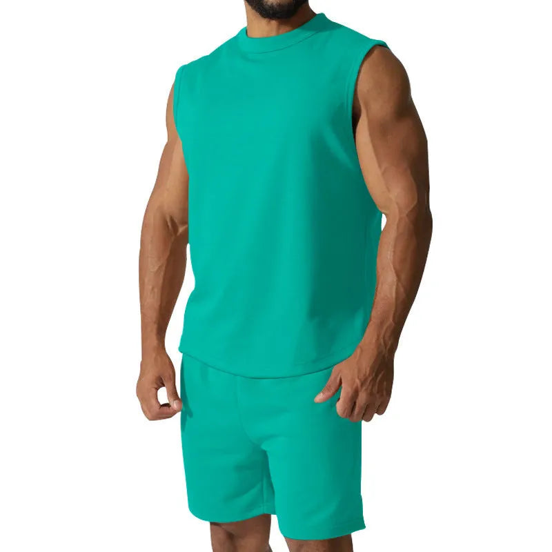 Men's sleeveless cotton blend sports top and matching shorts in a solid colour