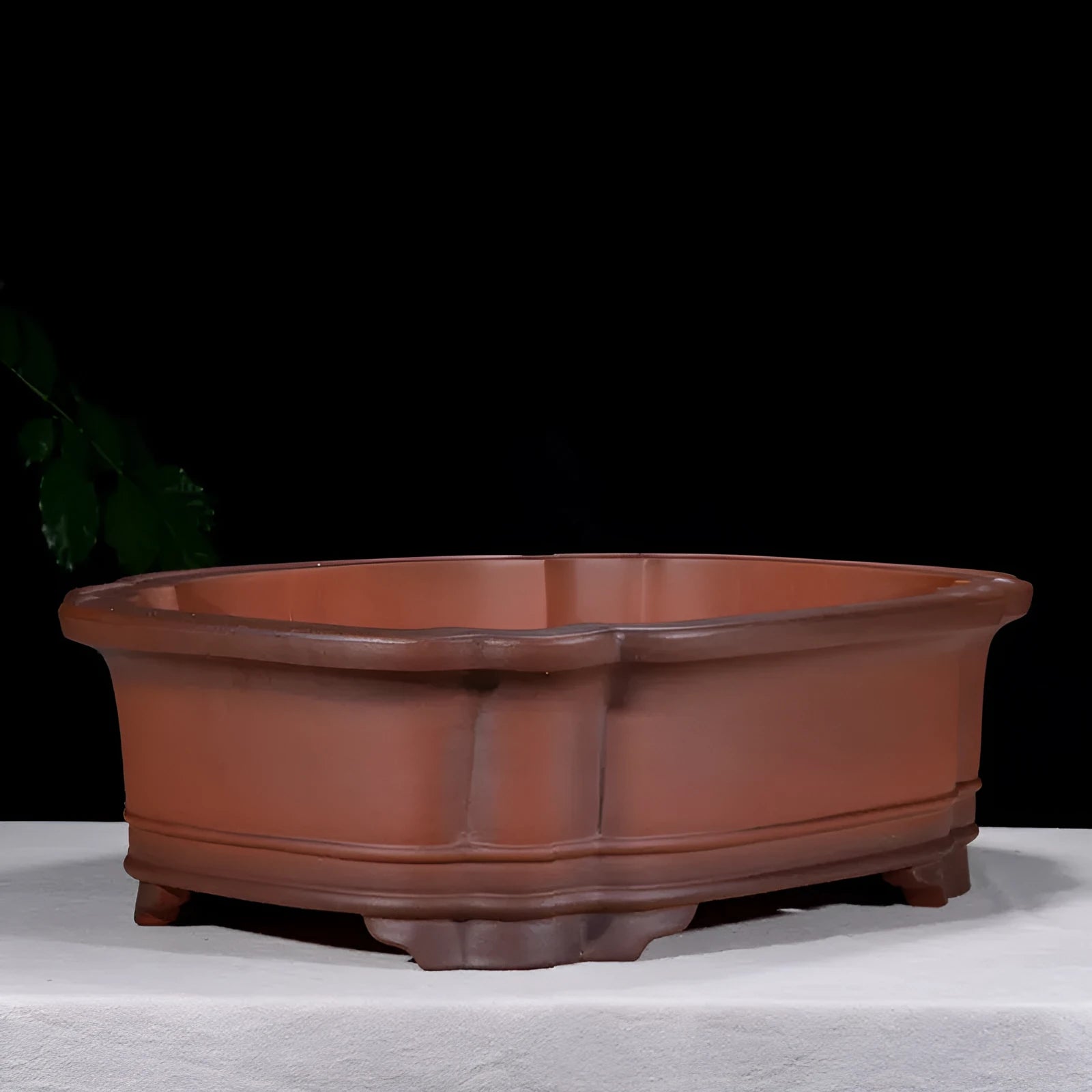 Large antique-coloured Chinese style purple clay flower pot showing dimensions.