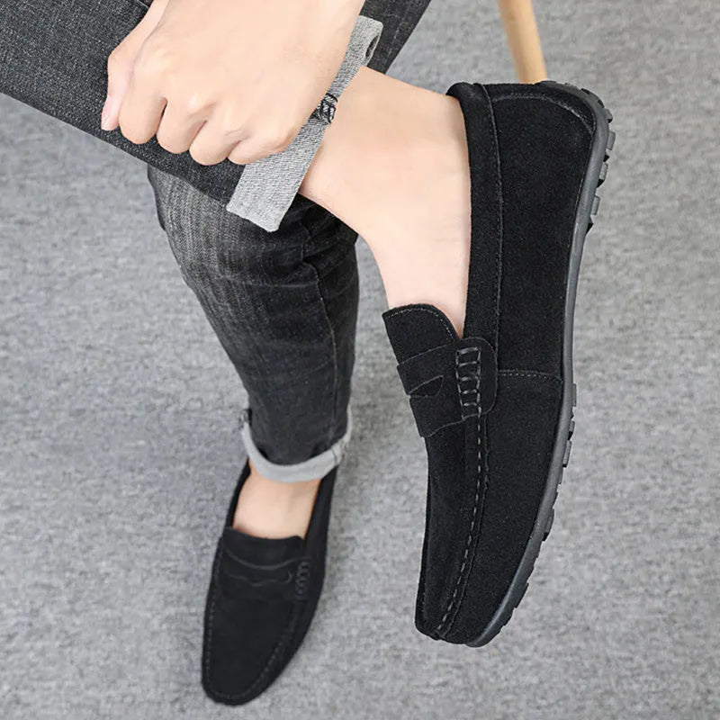 Men's suede leather slip-on loafers in various colours with a flat rubber sole and round toe