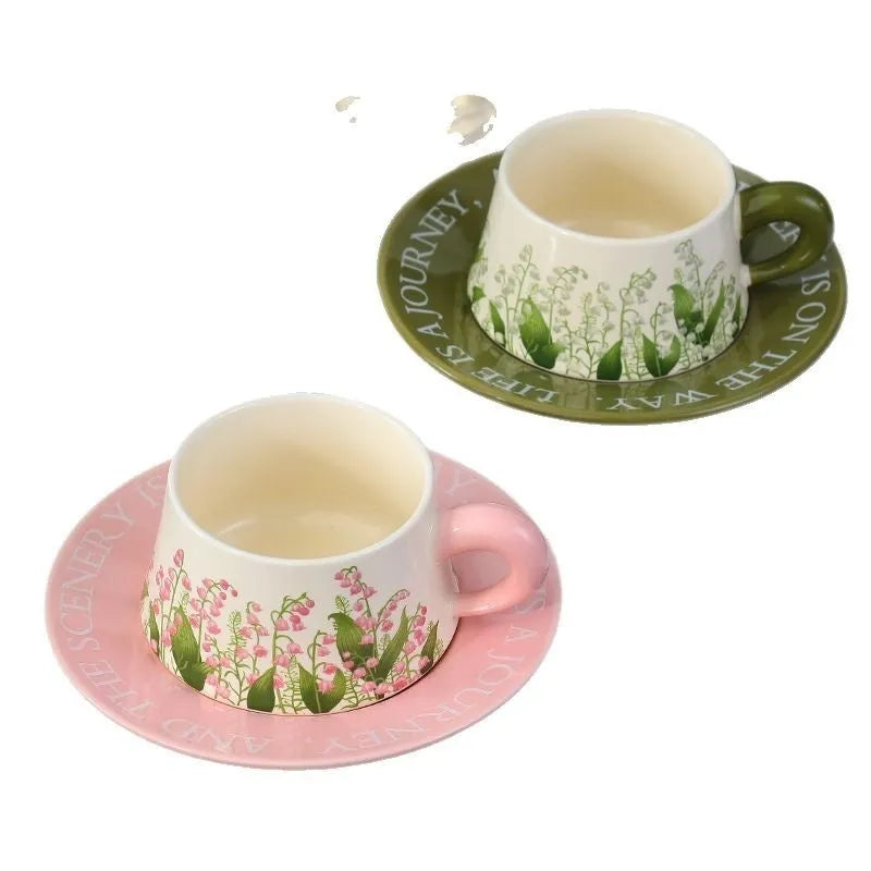 Ceramic coffee cup and saucer set with two cups, two plates, and two spoons in 300ml capacity