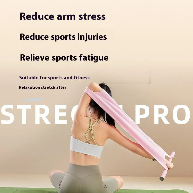 Grey and pink yoga stretching tool for shoulder, back and hip flexibility.