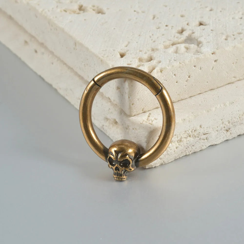 Copper punk earrings with ghost head design in antique silver or ancient gold colour