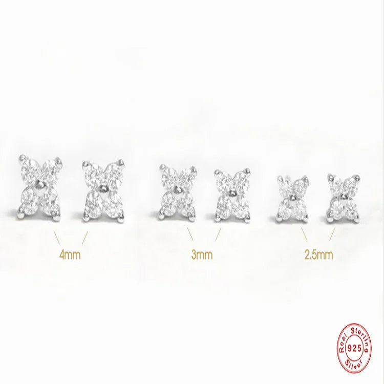 S925 sterling silver stud earrings with a geometric petal crystal flower design in gold or platinum finish.