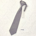 Men's navy blue cotton bow tie with arrow-style design on a white background.