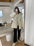 Women's high waist wide-leg knit trousers in cream white colour, laid flat to show straight-leg cut.