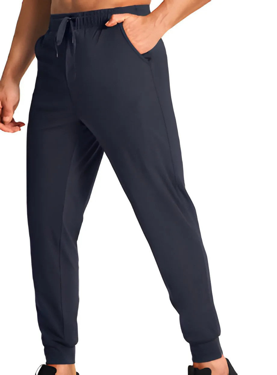 Men's loose fit casual polyester trousers in solid colour available in multiple sizes