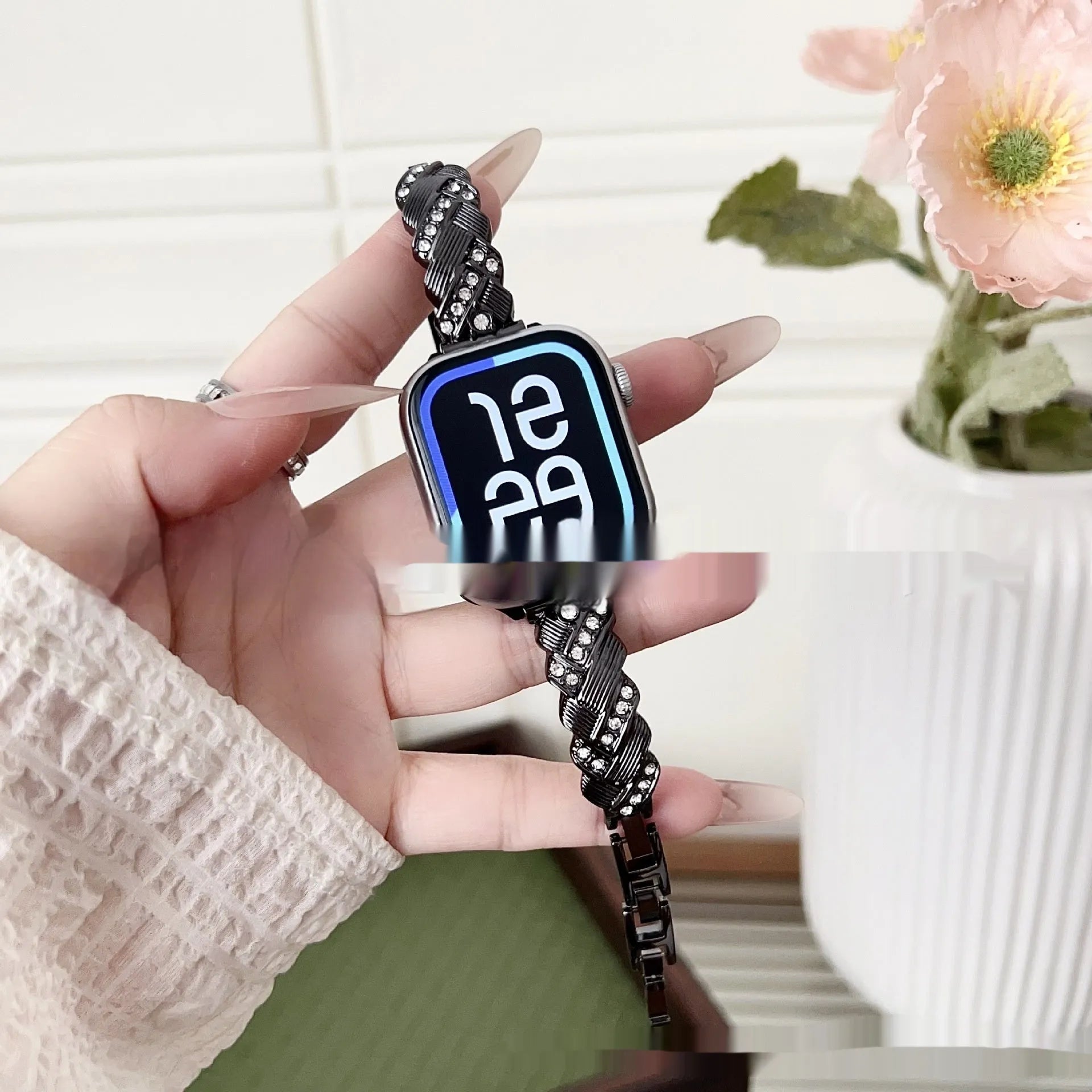 Personalised twist diamond design metal watch strap for Apple Watch in rose gold colour.
