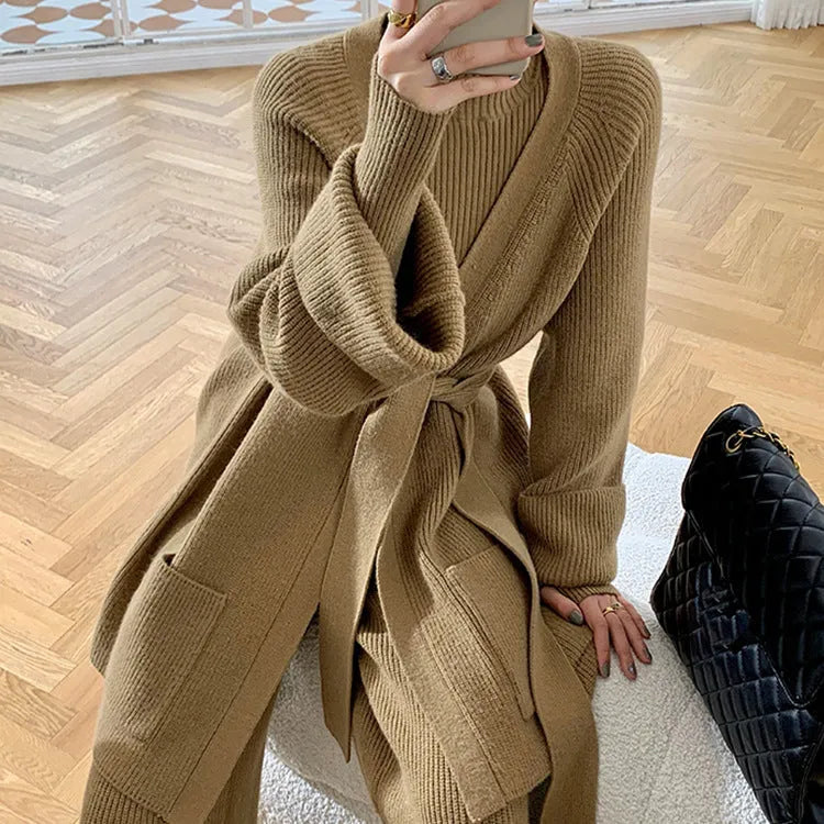 Women's knitted three-piece set showing sweater, cardigan, and wide-leg pants with leather stitching detail