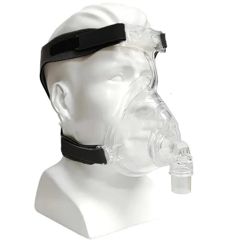 Transparent CPAP breathing mask with silicone cushion and adapter elbows for ventilator connection