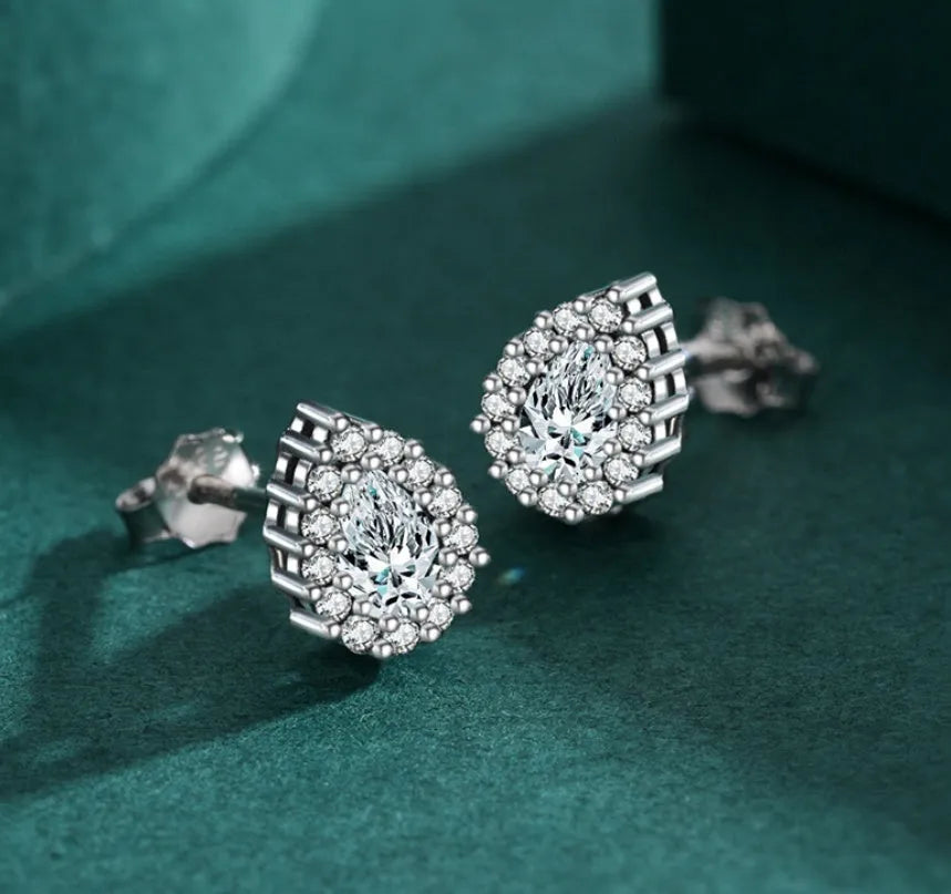 Women's sterling silver drop earrings with water drop shape and diamond treatment