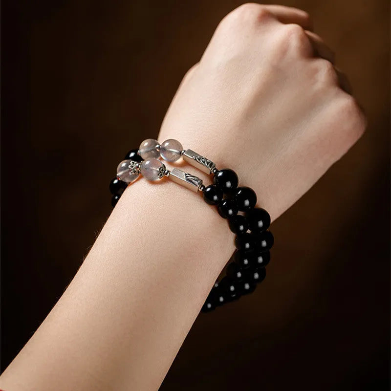 Obsidian Buddha beads couple bracelet DIY kit showing 8mm and 10mm beads for women's and men's spiritual jewellery