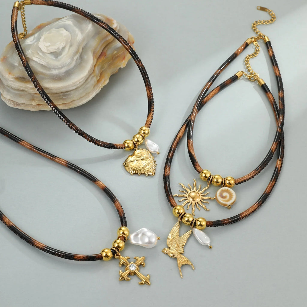 Women's stainless steel necklace with geometric leopard leather pendant on gold chain